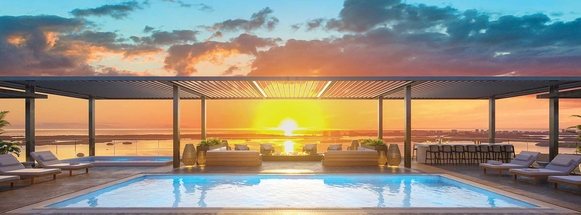 Island West West Island at West Bay Rooftop Pool Sunset