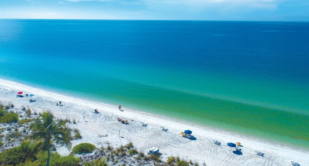 island at west bay beach aerial of the gulf of mexico