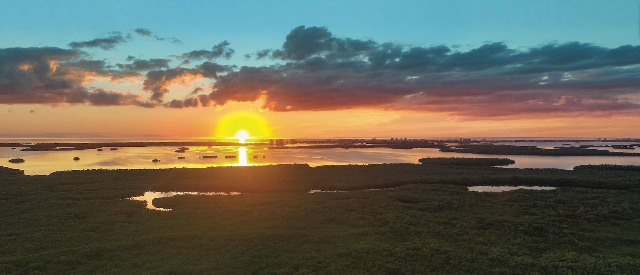 Island West Bay Sunset Over The Horizon