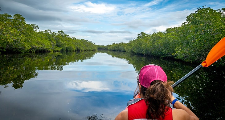 Girl Kayaking in Estero Bay