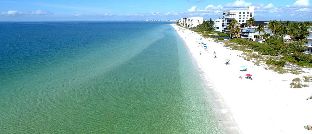 aerial of beach near island west bay