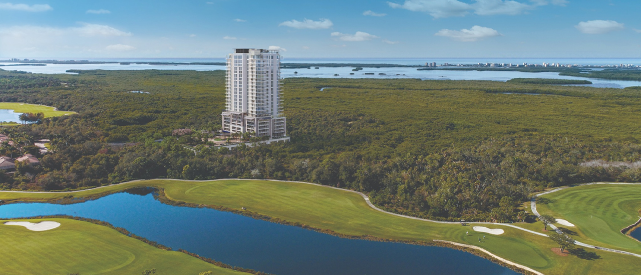 Residential tower surrounded by wetlands and water.