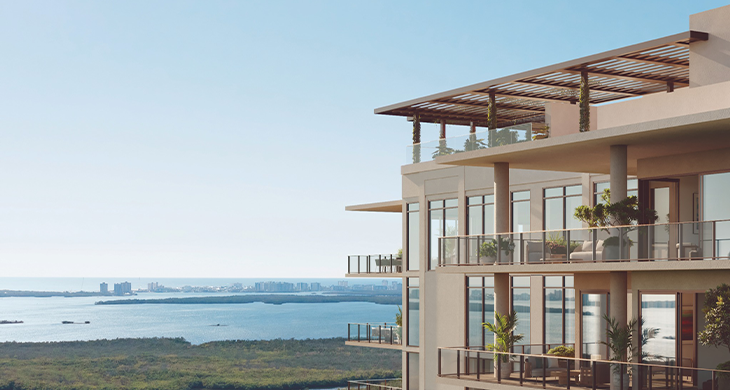 Modern condo balconies overlooking coastal waterway